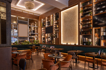 Fototapeta premium Stylish double-level restaurant featuring wooden décor, chandeliers, and warm ambient lighting