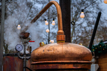 Copper still for fruit brandy or eau de vie, Christmas market, Strasbourg France