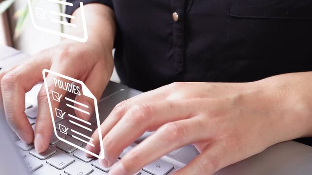 Detail of female hands typing on a laptop computer with an animation of various policy documents from an organization