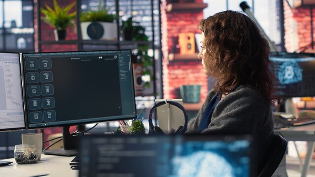 Freelancer woman employs online AI assistant to automate text generation and solve tasks easily, enhance productivity at the office. Integration of advanced algorithms and digital tools. Camera B.