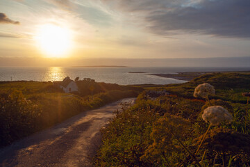 Beautiful sunset  scenery landscape with on Ireland coastal beach views of doolin and the aran islands.