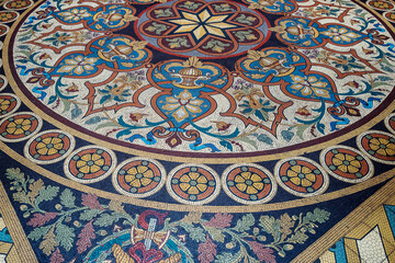 Obraz premium Decorative Portuguese tile mosaic for floor, built in 19th-century neoclassical style, with Tuscan and English neo-Palladian architecture. Portugal, 2023