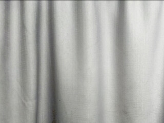 Fototapeta premium Calm Grey Fabric Surface with Natural Flowing Folds