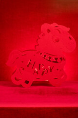 Chinese New Year of Horse mascot on red at vertical composition