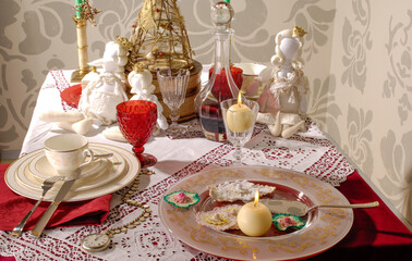 beautifully decorate the table with dishes for a festive New Year's backdrop