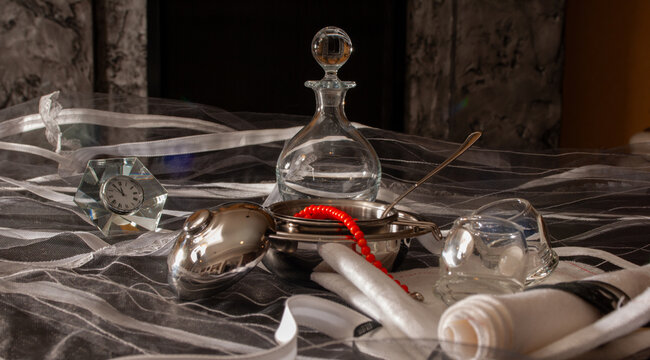 beautifully decorate the table with dishes for a festive New Year's backdrop