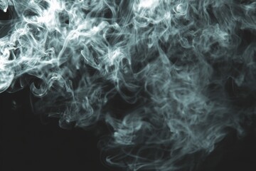 White smoke creating abstract swirling shapes on dark background