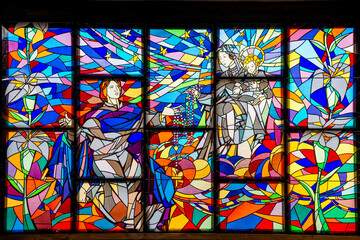 Stained glass window with religious motifs in the church of S&atilde;o Domingos de Benfica. Lisbon-Portugal.