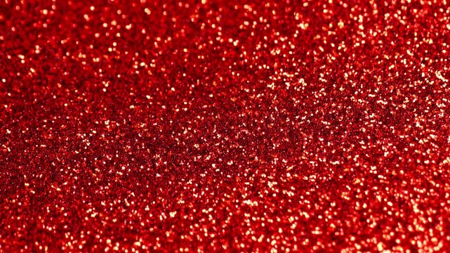 Christmas festive wallpaper.Red glitter texture background.Shimmer of gold and red glitter. New Year wallpaper. 4k footage