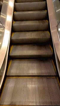empty moving escalator moving up, mechanic electric Stair