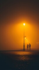 Couple Silhouettes in Orange Fog Under Lamppost