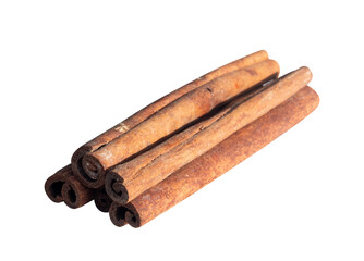 a pile of cinnamon sticks on a white background
