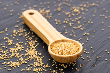 Raw amaranth seeds in a measuring spoon - Amaranthus