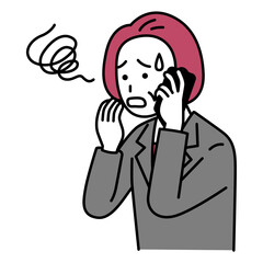 スマートフォンでの通話で困惑する中年のスーツの女性