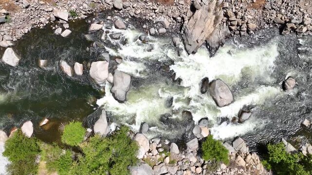 Aerial River Rapids and Rocky Terrain Stationary Top Down Motion