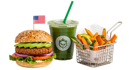 Healthy vegan burger with avocado and sweet potato fries next to a green smoothie drink