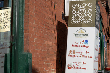 Fototapeta premium sign at The Distillery Winter Village 2025 located at 55 Mill St, Toronto