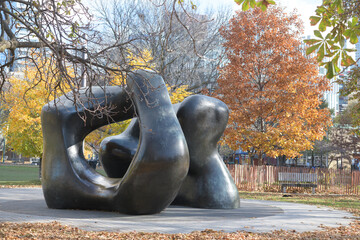 Fototapeta premium view of Henry Moore's sculpture Large Two Forms installed in Grange Park, Toronto