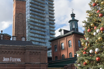 Fototapeta premium historic buildings and sign for John Fluevog Shoes Toronto Distillery