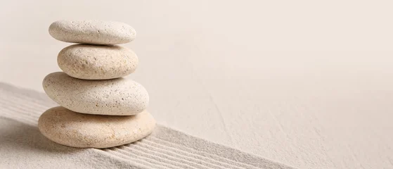 Fotobehang Zen Stenen Stack of stones on sand with lines. Zen concept  © Pixel-Shot