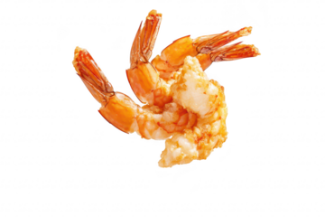 A beautifully cooked. golden-brown shrimp. perfectly suspended in mid-air against a clean white background. its appetizing texture and inviting appearance for culinary presentations