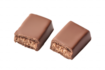 Two chocolate bars with a smooth. shiny coating. one cut in half to reveal a creamy filling. placed on a clean white background. ideal for food photography or advertising