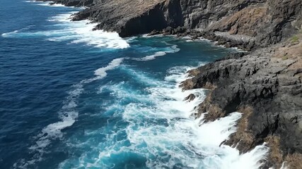 Ocean Waves Crashing on Rocky Shoreline During Daytime Footage