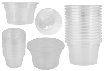 Clear plastic dipping sauce cups stacked on a white background