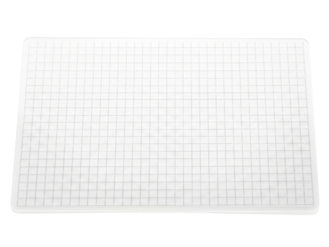 White plastic cutting mat with grid lines for craft projects on a transparent background
