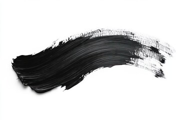 Single smooth brushstroke of thick black paint on white background displaying textured paint strokes and glossy finish
