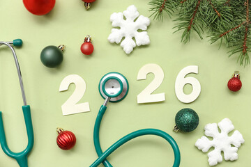 Composition with paper figure 2025, stethoscope and Christmas decorations on color background