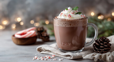 Hot Chocolate with Whipped Cream and Candy Canes on Tablecloth with Pine Cones and Warm Lighting