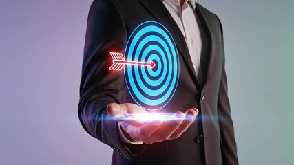 Businessman holding a target with an arrow, business concept of success.