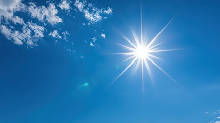 Bright Sun Shining in a Clear Blue Sky with Wispy Clouds Sunlight Flare and Celestial Atmosphere