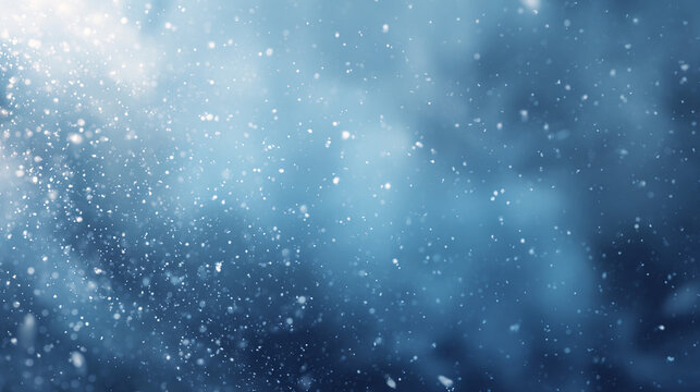 Blue winter snowfall bokeh background with falling snowflakes and soft abstract blur