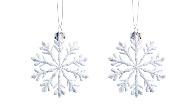 Two white snowflake ornaments isolated on transparent background