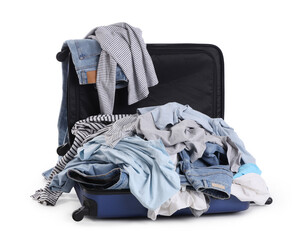 Suitcase full of dirty clothes isolated on white background