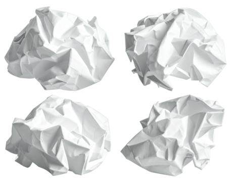 Crumpled white paper balls on a dark background