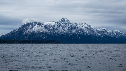snow covered mountains San Carlos de Bariloche Patagonia Argentina glacial lake Nahuel Huapi, next to the Andes Mountains