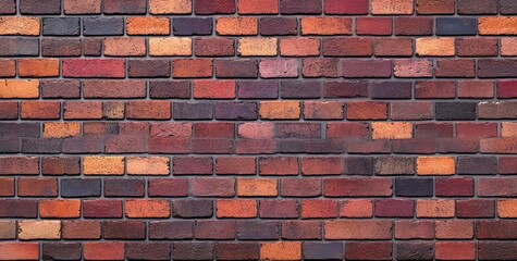 Close-up view of a textured brick wall featuring varied shades of red, orange, and maroon bricks with visible mortar lines creating a rustic and sturdy appearance