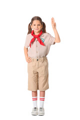 Little girl scout showing scout sign on white background. World Scout Day