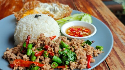Stir fry pork with holy basil.