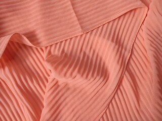 background and pattern of plain pink fabric with striped motif