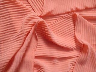 background and pattern of plain pink fabric with striped motif