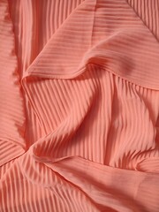 background and pattern of plain pink fabric with striped motif