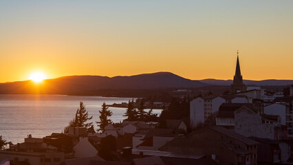 sunset over the lake San Carlos de Bariloche, Civic Center, Patagonia Argentina glacial lake Nahuel...
