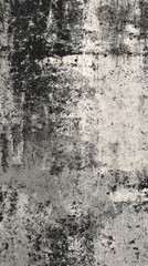 Fototapeta premium A textured surface featuring a blend of black and white tones, creating an abstract, weathered appearance.