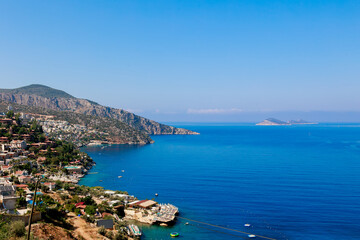 The densely built-up coastline with its turquoise Mediterranean lagoon stretches into the distance, offering incredible views.