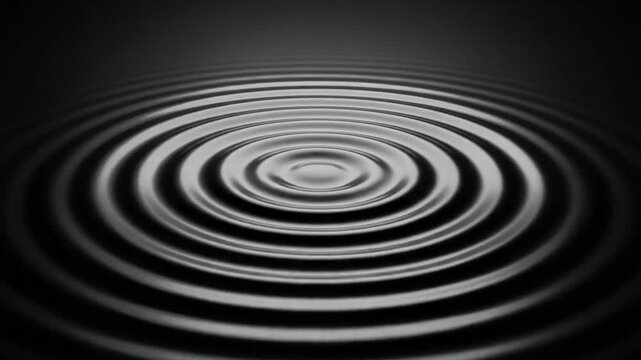 Elegant dark liquid ripples expand, perfect for sophisticated business presentation