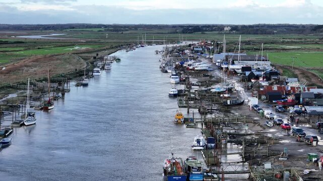 Row of moored boats Southwold Harbour Suffolk UK drone,aerial